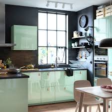 Striking Black And Green Kitchen With Kallarp Doors In High Gloss Light Green And Ostern Green Kitchen Cabinets Traditional Kitchen Design Light Green Kitchen