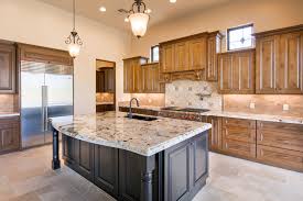 Design Your Kitchen With Wood Stained Cabinets And An Accent Painted Island Like This One Stained Kitchen Cabinets Custom Kitchen Cabinets Design Your Kitchen