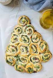 They're filled with spinach dip and topped with garlic butter. Quick And Easy Artichoke Spinach Pinwheels Christmas Tree