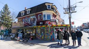 Kensington market is just to the west of chinatown and is the bohemian heart of canada, based in a multicultural history it is now a flurry of independent stores, restaurants, bars and shops that bring the world's foods to one tightly knit community. Kensington Market Toronto Pics