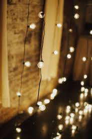 Cozy Brooklyn Winter Wedding Ruffled Bistro Lights Gold Wedding Inspiration Cool Lighting