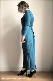 The sleeveless design has a round neckline and a wrap tie closure at the waist. Kickin Around In A Merino Kielo Wrap Dress I Sew Therefore I Am