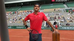 Roger federer overcame a confrontation with the umpire and some powerful marin cilic play to reach the third round at roland garros. Smffikcwmqkq M