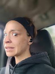 They are covering their eyes, not ears