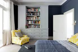 The walls are a dark gray, which is more modern. Blue Yellow Gray Bedroom Contemporary Bedroom Arent Pyke