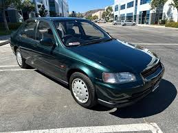 Image result for Medium Green 2004 Isuzu