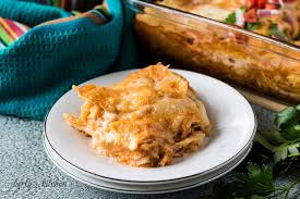 Once fully layered, the casserole is ready to bake! Layered Chicken Enchilada Casserole Recipe Berly S Kitchen