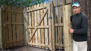 Fill in around the post with concrete, while keeping the post plumb with a level. How To Build A Fence Gate Perfect Mount Trick Youtube