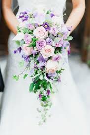 A rustic outdoor august wedding, on the other hand, would work well with colors like russet brown and sunflower yellow. By Signature Flowers Emma Newman Lilac Shower Bouquet Wedding Flowers Floristry Clem Purple Wedding Bouquets Cascading Wedding Bouquets Pretty Wedding Bouquet