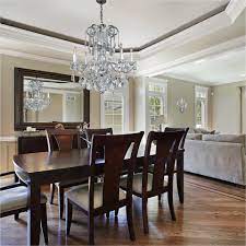 Dining room chandeliers provide right glow for relaxed eating and happy conversation. The Ultimate Crystal Chandelier Guide Glow Lighting