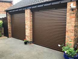 Roller garage doors are a great addition to any garage for space saving and insulation with added security. Photo Gallery For Roller Shutter Garage Doors Pictures Of Garage Door Types Roller Shutter Garage Doors Roller Shutter Up Over Designs More
