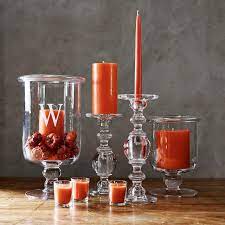 This hurricane adds warm, rustic charm to a dining table or mantel. Williams Sonoma Classic Glass Hurricane Candle Holder Williams Sonoma