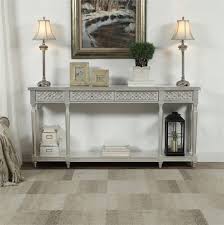 With generous proportions and a luxurious silver leaf finish, our agnes console makes a lasting impression in any space. Silver Leaf Console Table