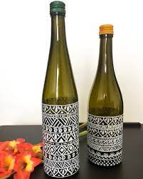Repurposing Discarded Wine Bottles With Simple Patterns Draw Any Pattern You Like With Sharpies Posca P Glass Bottles Art Bottle Art Diy Glass Bottle Crafts