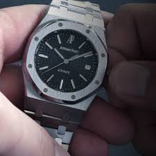 Audemars piguet royal oak 41 4302 1:1 clone black dial steel case and bracelet ref. Audemars Piguet Care Tips
