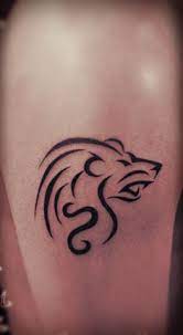 The lion face inked in a large softly shaded design on the back of this woman is realistic enough to look like it'll jump out. 36 Leo Tattoos To Make You Proud Of Your Zodiac Sign