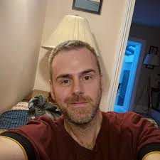 New haircut. New man. I'm so tired and, as you can see, some random person  keeps taking photographs of me from good angles showing off my hard-won  jawline. I'm sleeping, stop it. #