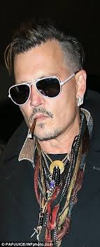 Amber Heard is spotted with heavily bruised forearm