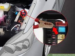 Connect the red positive jumper cable to the positive terminal in your car. Toyota Prius Toyota Prius Battery Jump Start