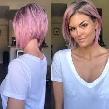 Pink looks great while maintaining her rock star image with this faux hawk. Krissafowles Short Pink Hair Hair Styles Short Thin Hair Hair Color Pink