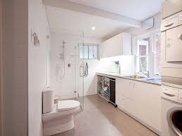 This laundry room uses colorful natural stone tile to set a rustic mood. 10 Bathroom Laundry Room Ideas 2021 The Two In One Model Laundry Room Flooring Laundry Room Bathroom Laundry Bathroom Combo