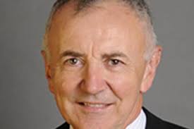 St John's patron in racial outrage