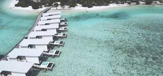 An artistic view of the overwater villas. Holiday Inn Resort Kandooma Maldives Official Site Maldives Resort