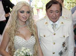She wore a wedding gown of a heavily jeweled strapless bustier with a floor length purple. Cathy Schmitz Marries Billionaire Richard Lugner 2oceansvibe News South African And International News