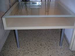 Built using ikea stands and a wooden board, this easy diy coffee table from weekday carnival is perfect for a modern living room. Coffee Table Ikea Light Wood With Glass Cover And Meta Flickr