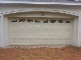 Amarr Stratford Series Short Panel Garage Door With Sunray Inserts Installed In Jacksonville Amarr Garage Door Installation Garage Door Panels Garage Doors