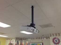 A Hitachi Classroom Series Projector Mounted To The Ceiling In A Classroom Projector Setup Projector Mount Ceiling Lights