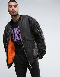 These jackets were first issued to members of the royal marine corps to help them brave the bitter cold that was a constant threat at such high altitudes. Reclaimed Vintage Synthetic Inspired Super Oversized Bomber Jacket In Black With Ram Back Print For Men Lyst