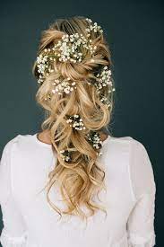 Loose Braided Half Updo With Baby S Breath Braided Hairstyles For Wedding Romantic Wedding Hair Wedding Hairstyles For Long Hair