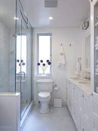 The trick is to use design principles to create the illusion the bathtub is the largest item that needs to fit within the space, which makes it a logical place to start your remodel. Contemporary Bathroom With Large Shower Height Toilets Floor Plans Bathrooms Cabinets Count Small Bathroom Layout Narrow Bathroom Designs Small Narrow Bathroom