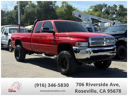 Image result for Medium Red 2000 Dodge