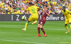 67' fc metz advance rapidly upfield but jerome miguelgorry blows for offside. B Cfeiz B56iem