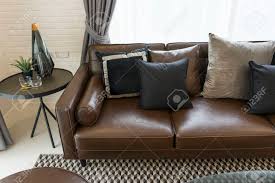 Pillows for red couch fresh sofa design description: Luxury Black And Grey Pillow On Dark Brown Sofa In Living Room With Side Table Stock Photo Picture And Royalty Free Image Image 108533245