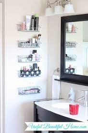 If you've squeezed all the essentials into a tiny bathroom but have no space for storage, try this lofty solution. Ways To Organize A Bathroom Without Drawers And Cabinets