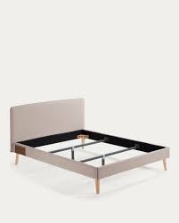 Dyla bed with removable cover in beige with solid beech wood legs for a 150  x 190 cm mattress | Kave Home International