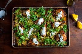 Sheet Pan Chicken With Potatoes Arugula And Garlic Yogurt Recipe Recipe Roasted Chicken And Potatoes Recipes Chicken Potatoes