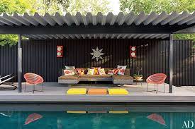 Tv, outdoor kitchen, and seating. 68 Outdoor Patio Ideas And Designs For Backyards And Rooftops Architectural Digest