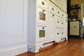 Main street alliance of oregon; Furniture Details Add Interest To This Farmhouse Painted White Framed Inset Cabinets By Huggy Bear Cu Kitchen And Bath Design Inset Cabinets Furniture Details