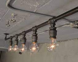 87 Exceptionally Inspiring Track Lighting Ideas To Pursue Homesthetics Inspiring Ideas For Your Home Industrial Track Lighting Industrial Light Fixtures Rustic Lighting