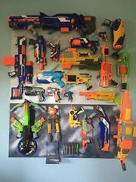 Similiar to a recent idea for a broom handle, patrick used instamorph to extend wall hooks to accept the much larger frame of his nerf gun collection. Massive Nerf Gun Bundle With Bespoke Wall Rack Storage Mount 210 00 Picclick Uk