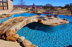 25 Fascinating Pool Bridge Ideas That Leave You Enthralled Pool Bridge Dream Pools Cool Pools
