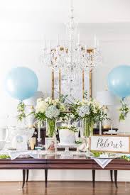 An Elegant Blue And White Baby Shower Southern Touches From Charming Boxwood Wreaths To Baby Shower Favours For Guests Elegant Baby Shower Baby Shower Flowers