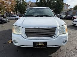 Image result for Olympic White 2003 Envoy