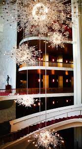 At Lobmeyr The Past Is Shimmering And The Future Crystal Clear Starburst Chandelier Chandelier Lights