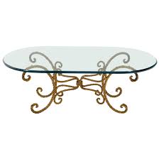 Looking for a good deal on glass coffee table? Twisted Wrought Iron Rope Gold Gilt Base Oval Racetrack Glass Top Coffee Table For Sale At 1stdibs