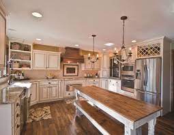 White can stand for itself, but introducing a dark shade can create the perfect contrast the eye needs to enjoy the coloring in your kitchen. How To Paint Kitchen Cabinets To Look Antique Designing Idea
